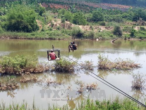 Người dân Kon Tum vẫn liều mình đu dây qua sông Pô Kô